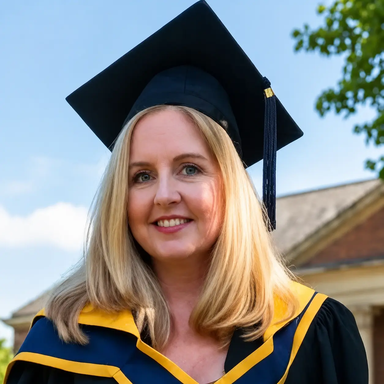 Teacher Sandra Borchardt in graduation attire